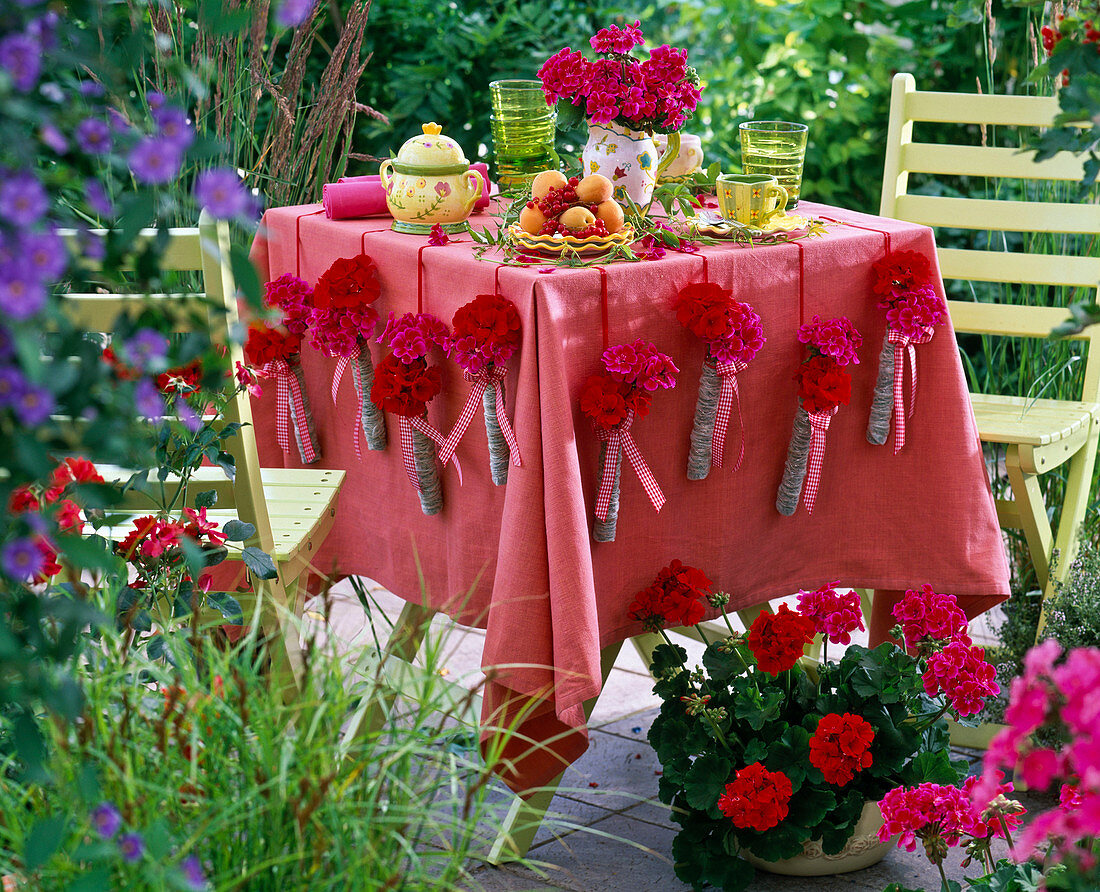 Wrapped glass tubes as vases on the tablecloth