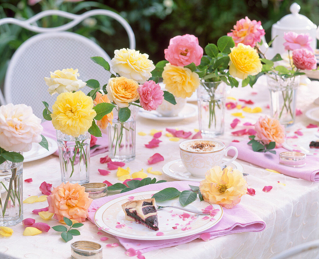 Late summer arrangement with pink (roses) in a tin box