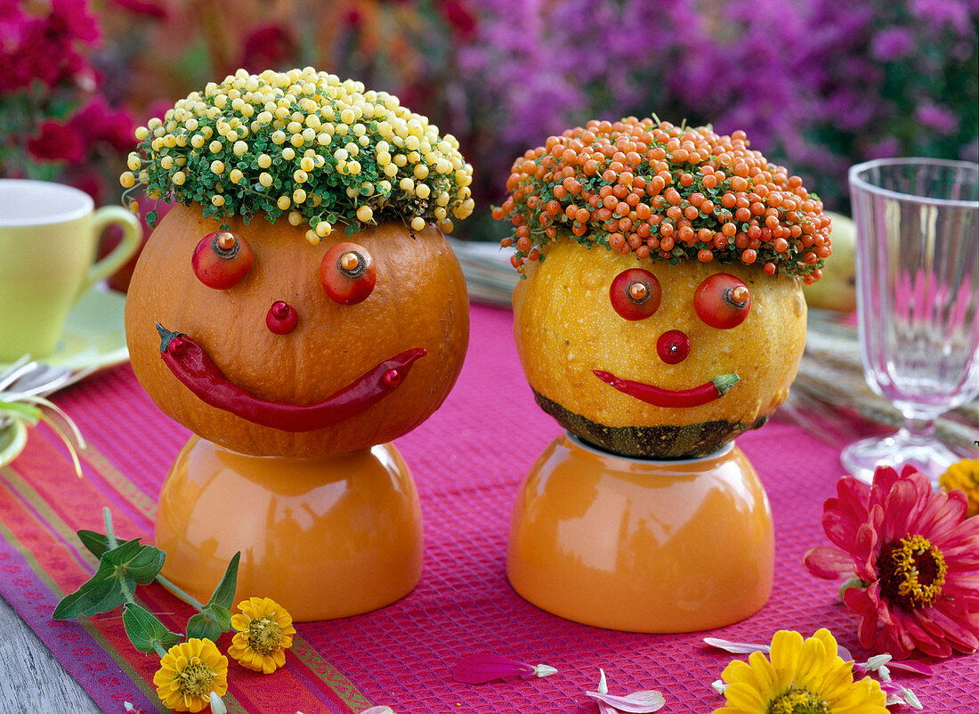 Faces of pumpkin and berries