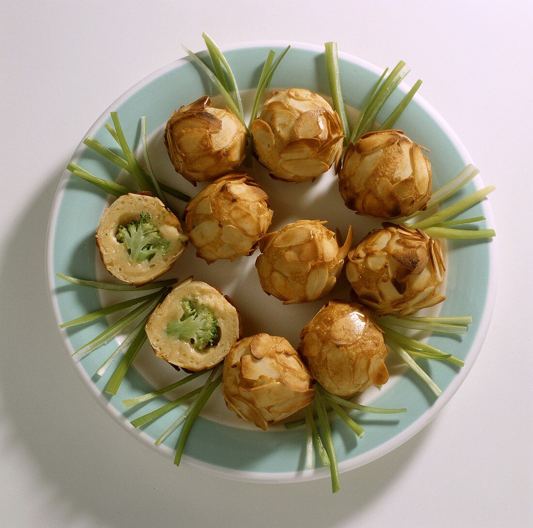 Crispy potato cakes with almonds and broccoli