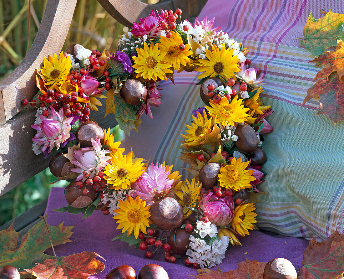 Heart-shaped wreath made of Helichrysum (strawflowers), Limonium (beach lilac)