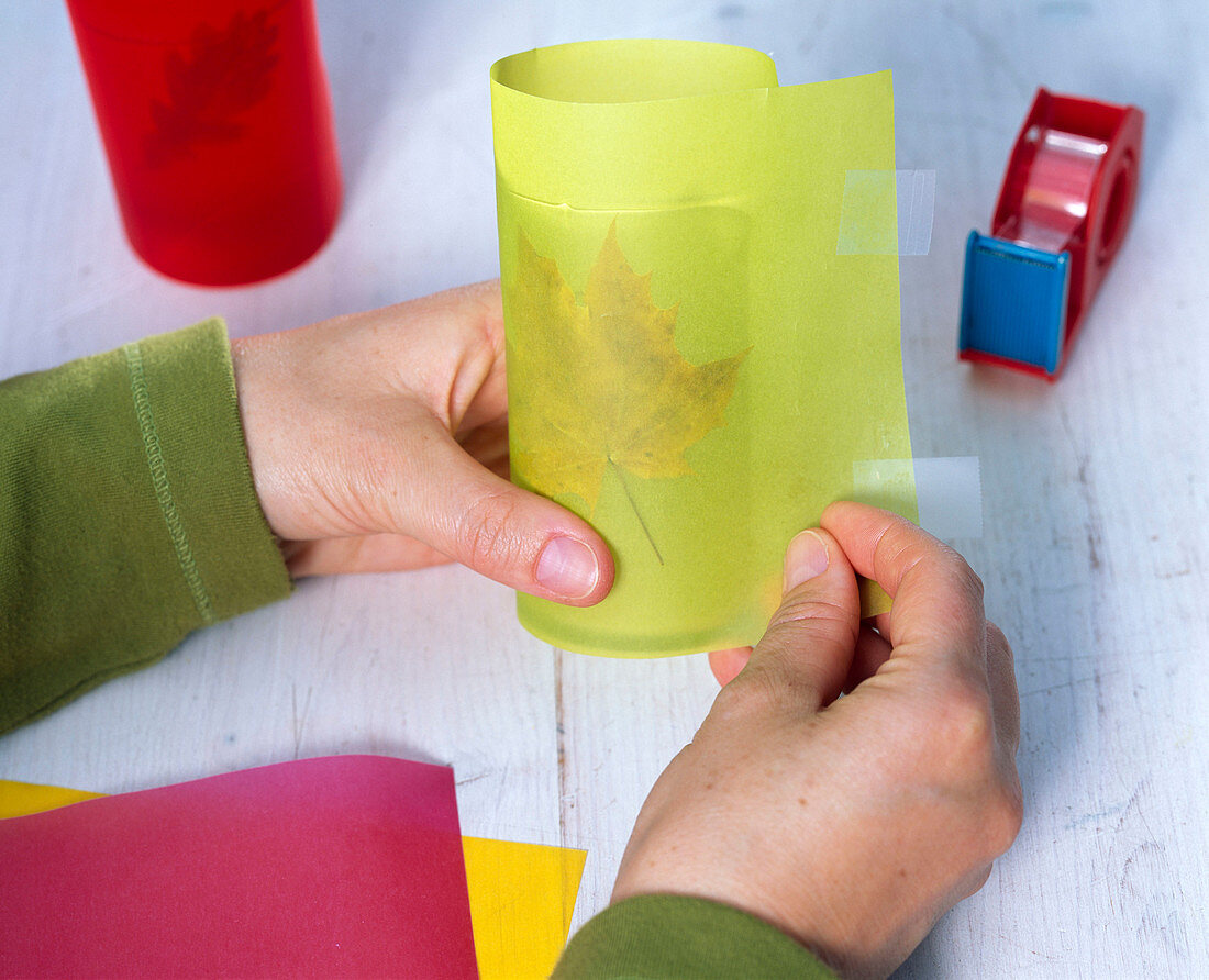 Lanterns with foliage and colorful parchment paper