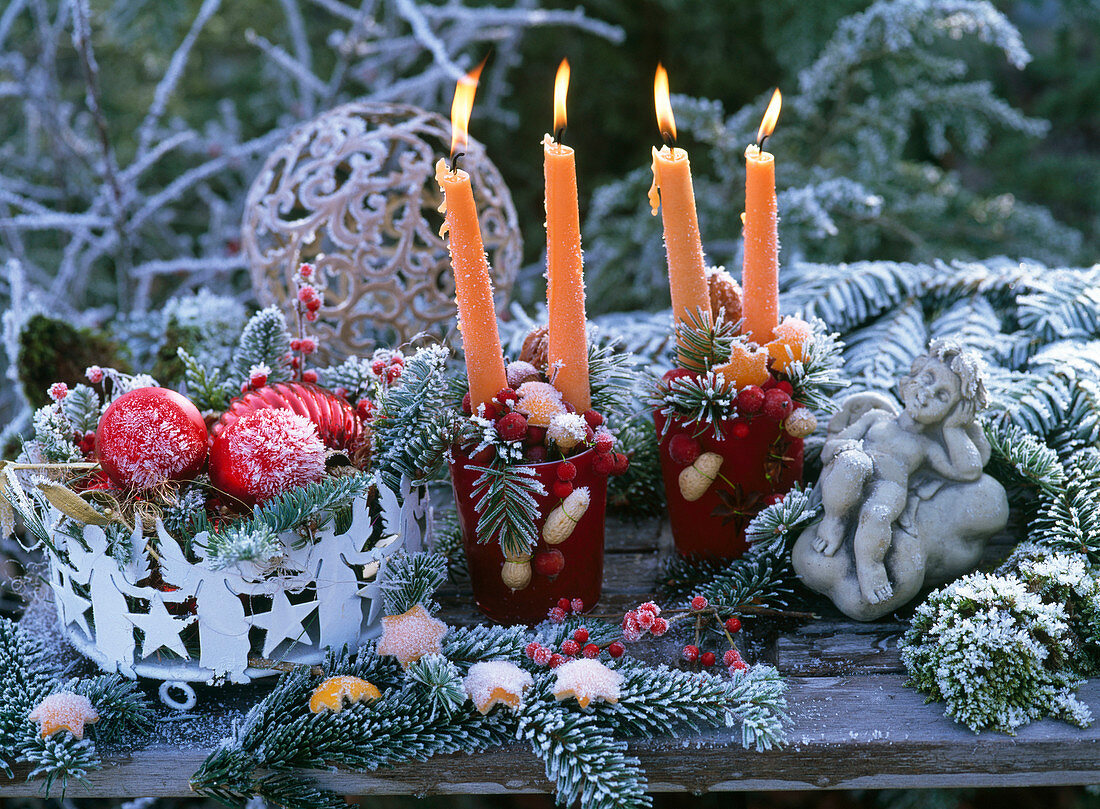 Advent wreath with orange candles, Abies nordmanniana, Citrus