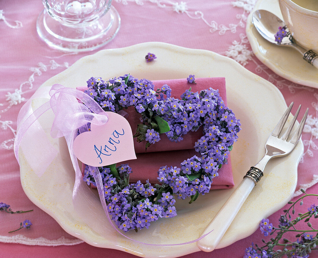 Heart shaped heart of Myosotis with name tag 'Anna'