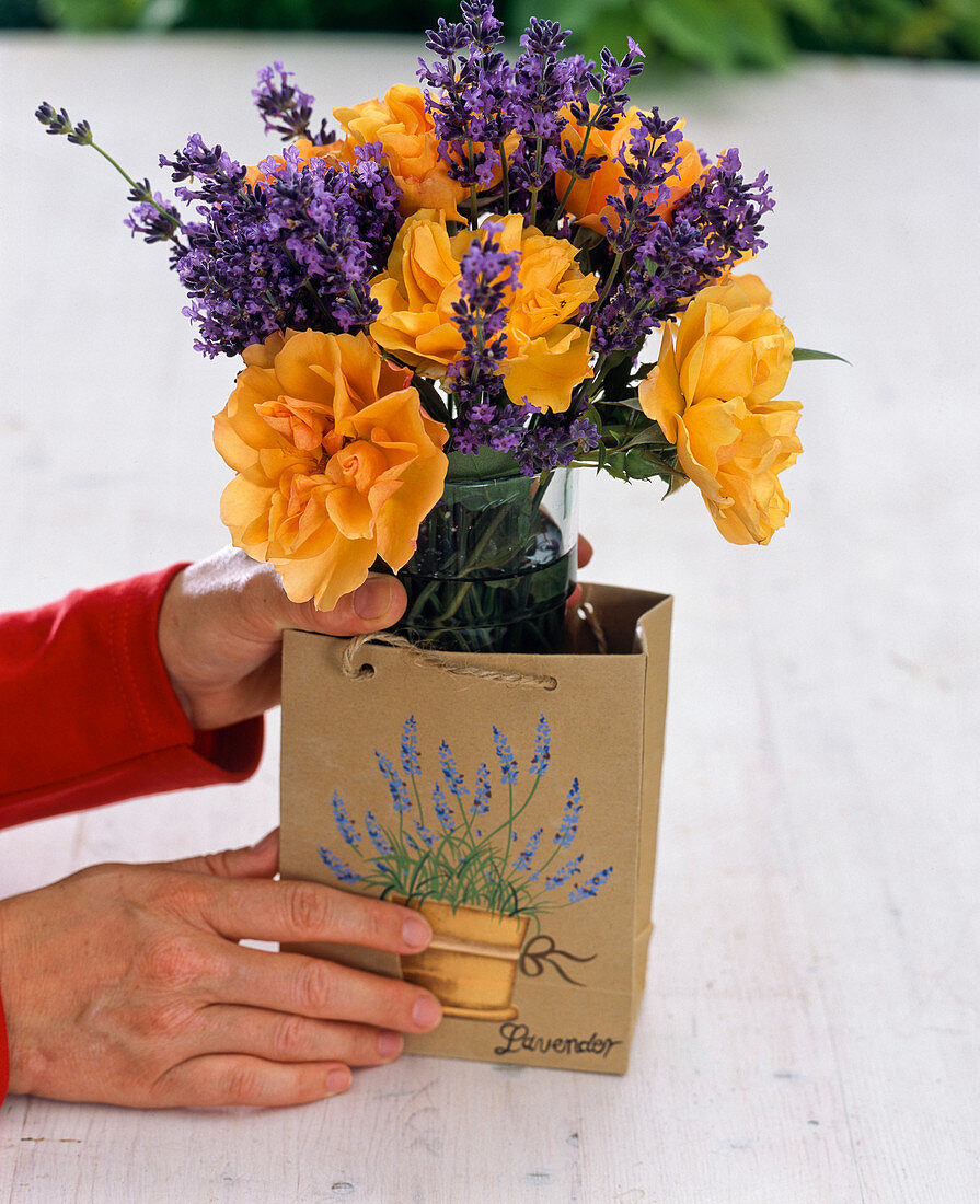 Bouquet of roses and lavender in paper bag (1/2)