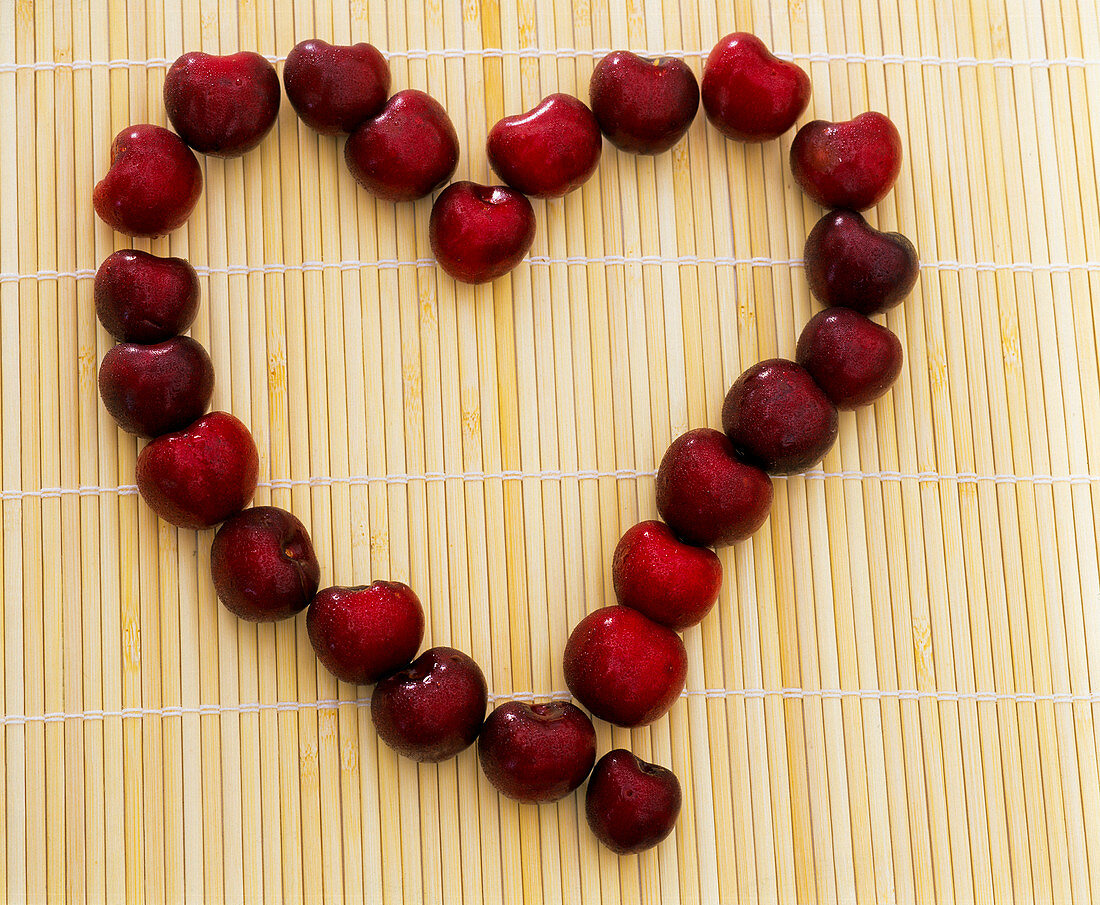 Heart of Prunus (cherries) on bamboo mat