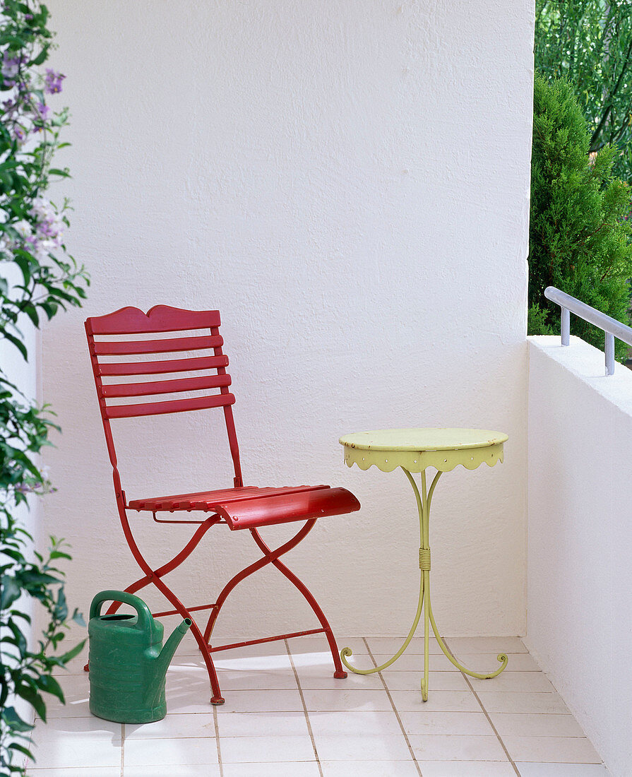 Before and after balcony previously empty with red deck chair and yellow table