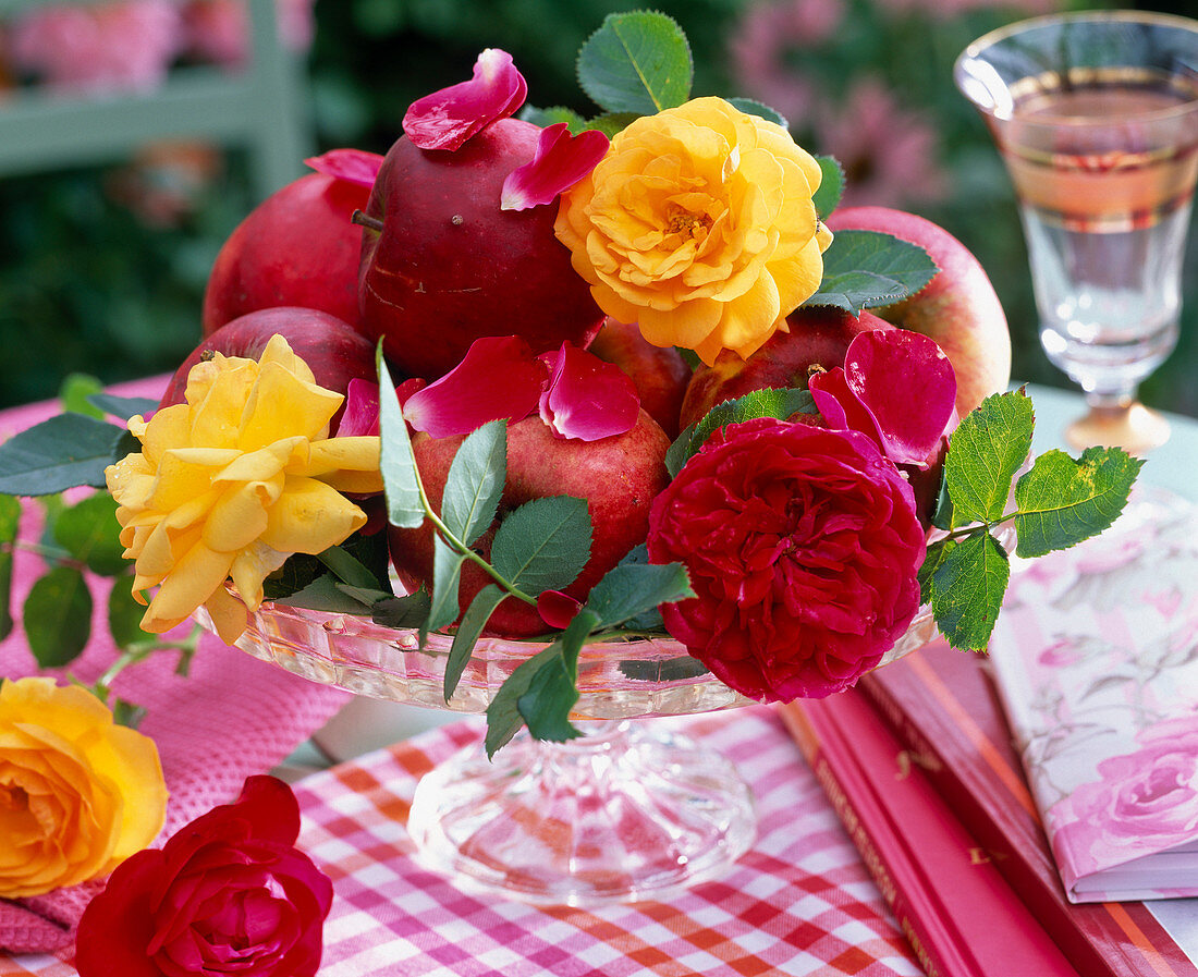 Malus (apples) and Rosa (roses) on glass bowl with foot, rose books