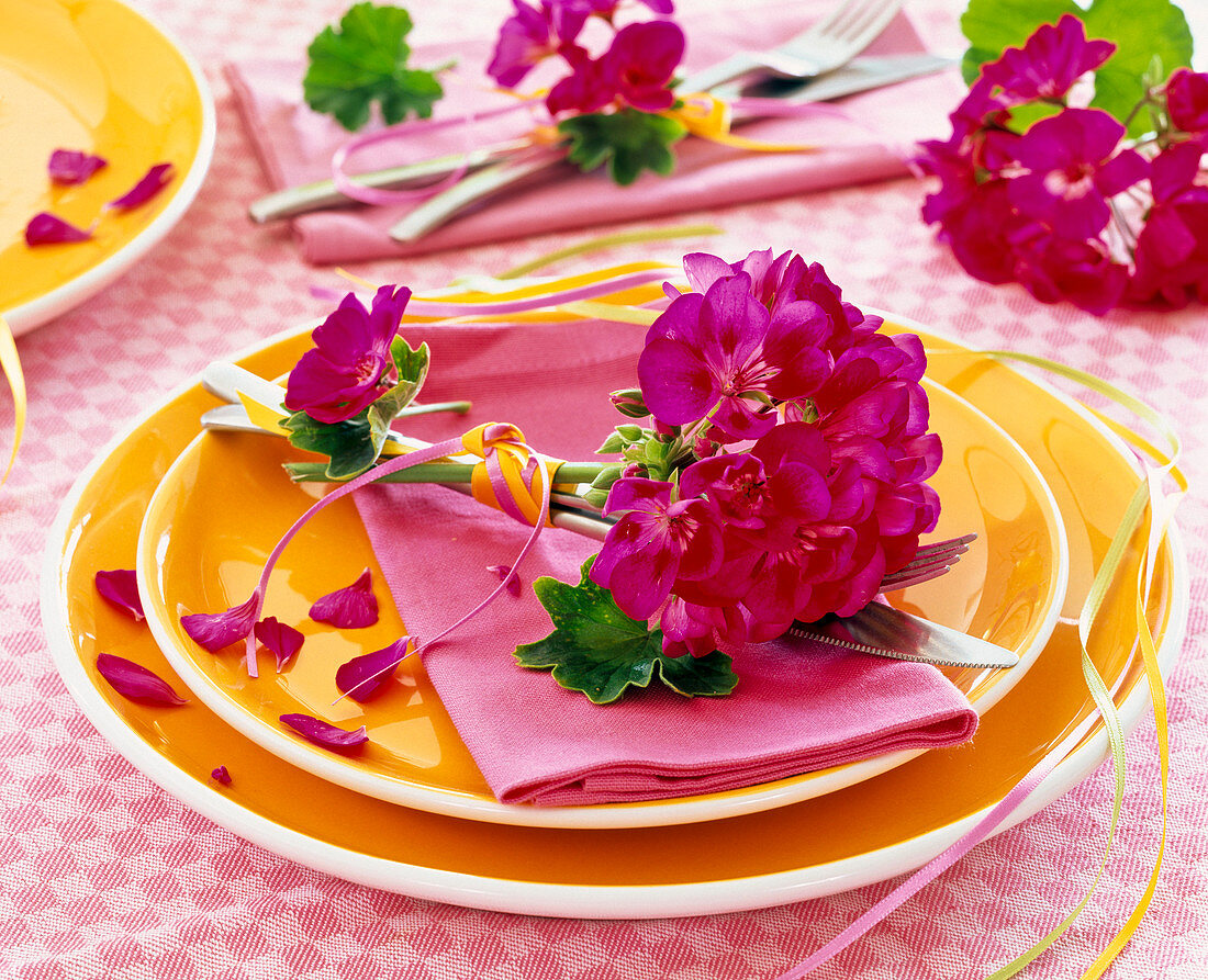 Pelargonium (geranium) tied to cutlery on a napkin