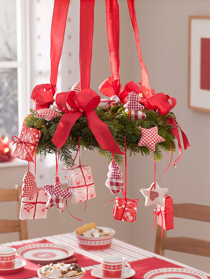 Wreath of Abies (fir) and Buxus (box) decorated with parcels