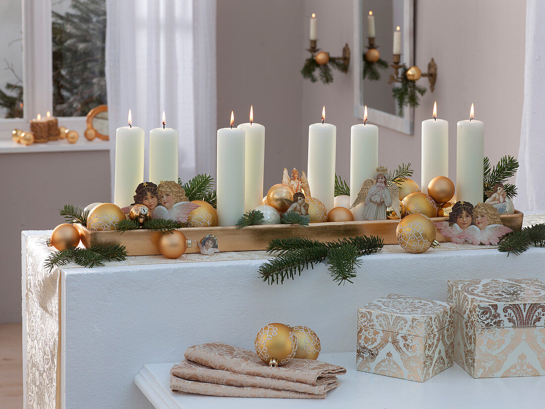 Advent wreath with 8 candles on a golden coaster, Christmas tree balls