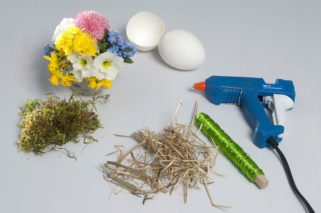 Eggshells as vases on moss