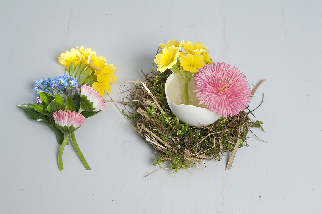 Eggshells as vases on moss