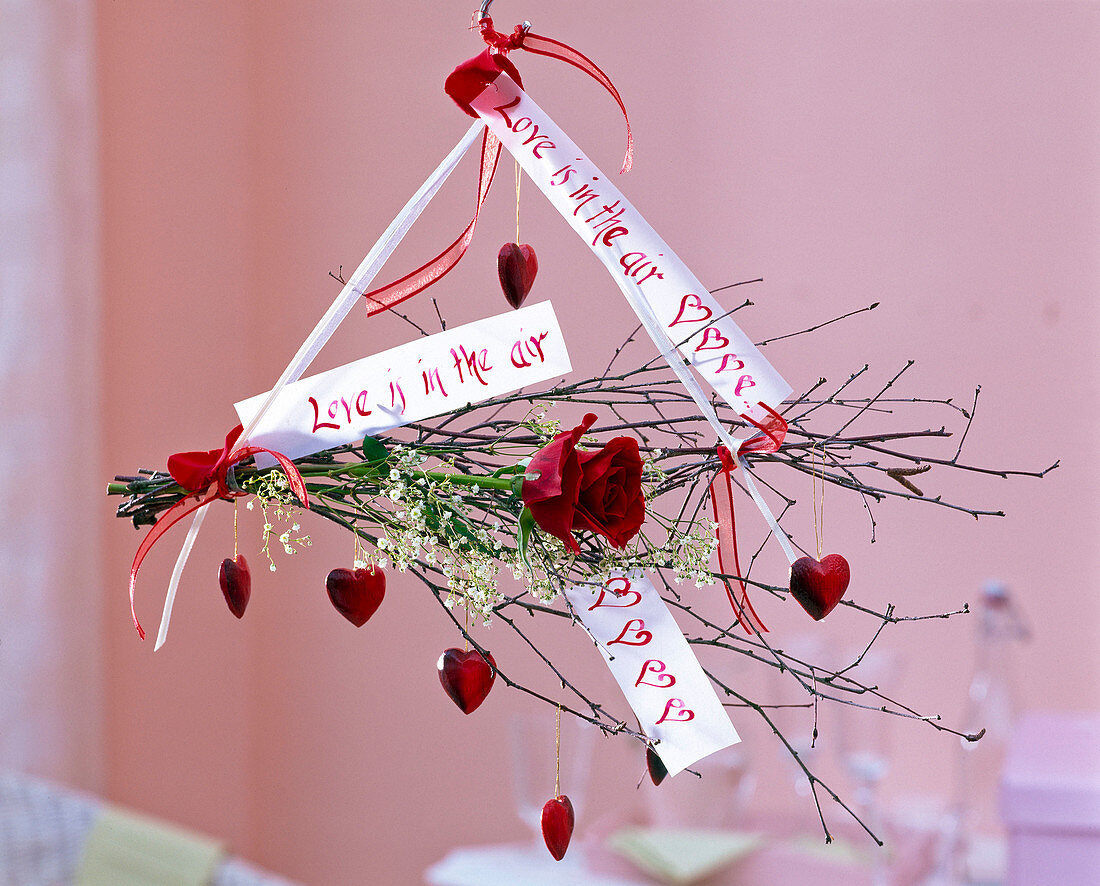 Red rose (rose), Gypsophila (baby's breath), branches of Betula (birch)