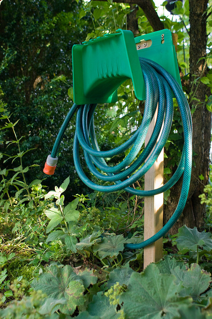 Garden hose on holder