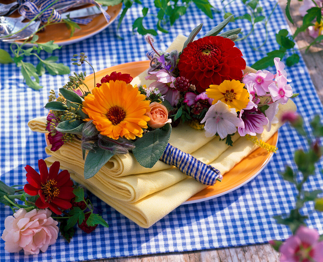 Small bouquets of calendula, zinnia, dahlia