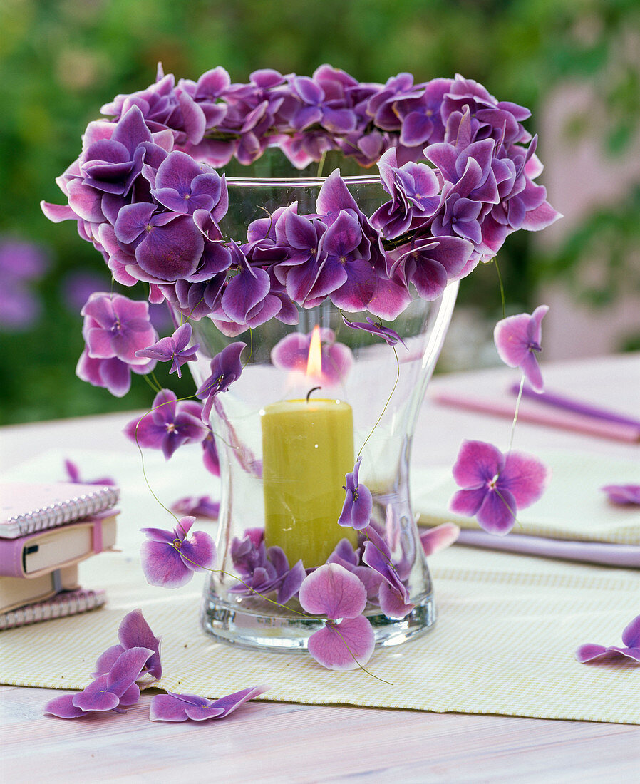 Threaded Hydrangea 'Tivoli Blue' flowers to make a lantern