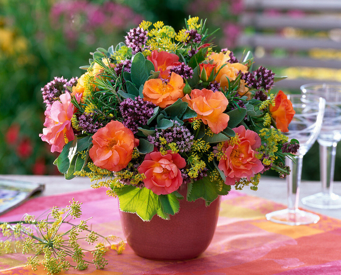 Roses with herbs, bouquet of rosa, Origanum, Salvia