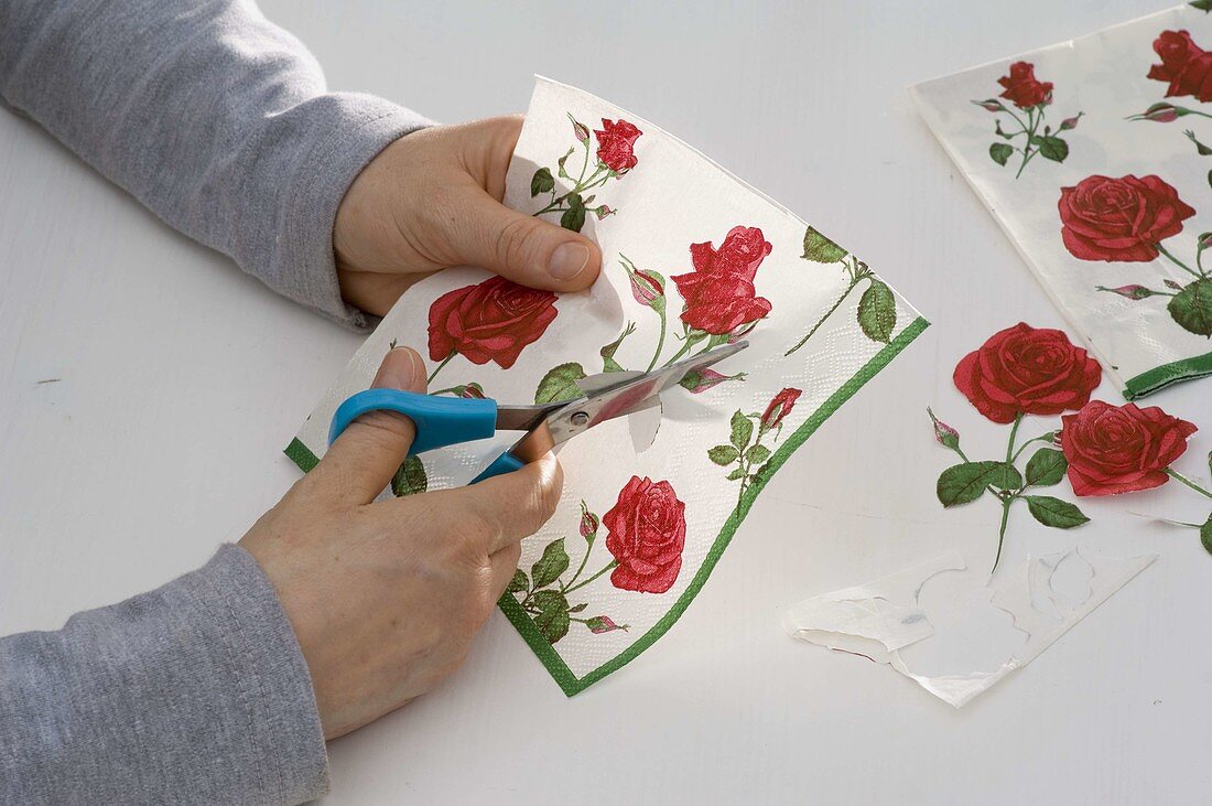 Roses in wooden carrier with napkin technique