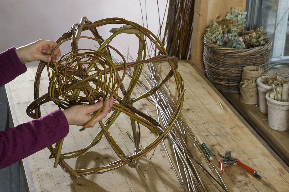 Wicker basket braided in spherical shape