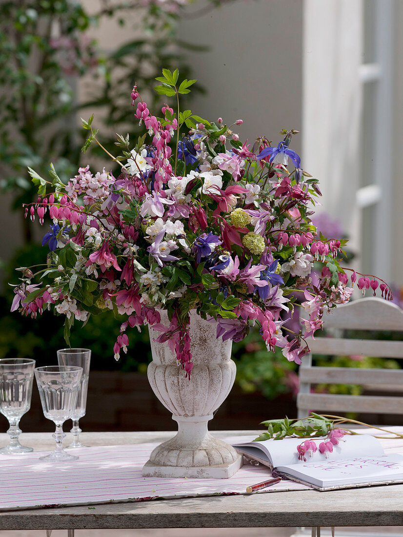 Spring bouquet of Aquilegia (columbine), Dicentra (watering heart)