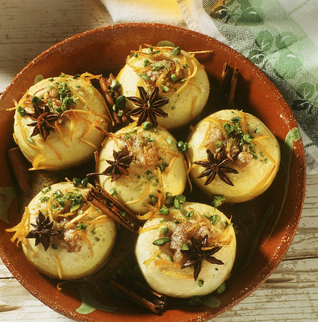 Baked apples with anise stars and julienned orange peel