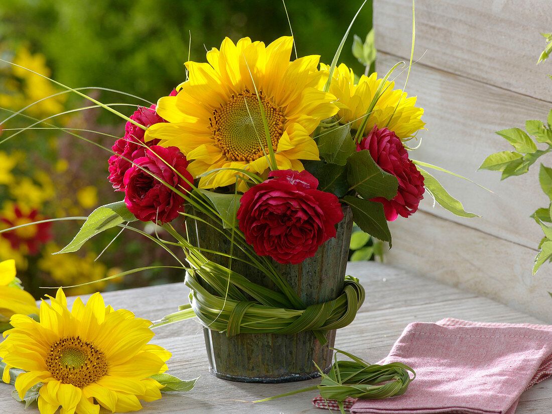 Small bouquet of sunflowers and roses