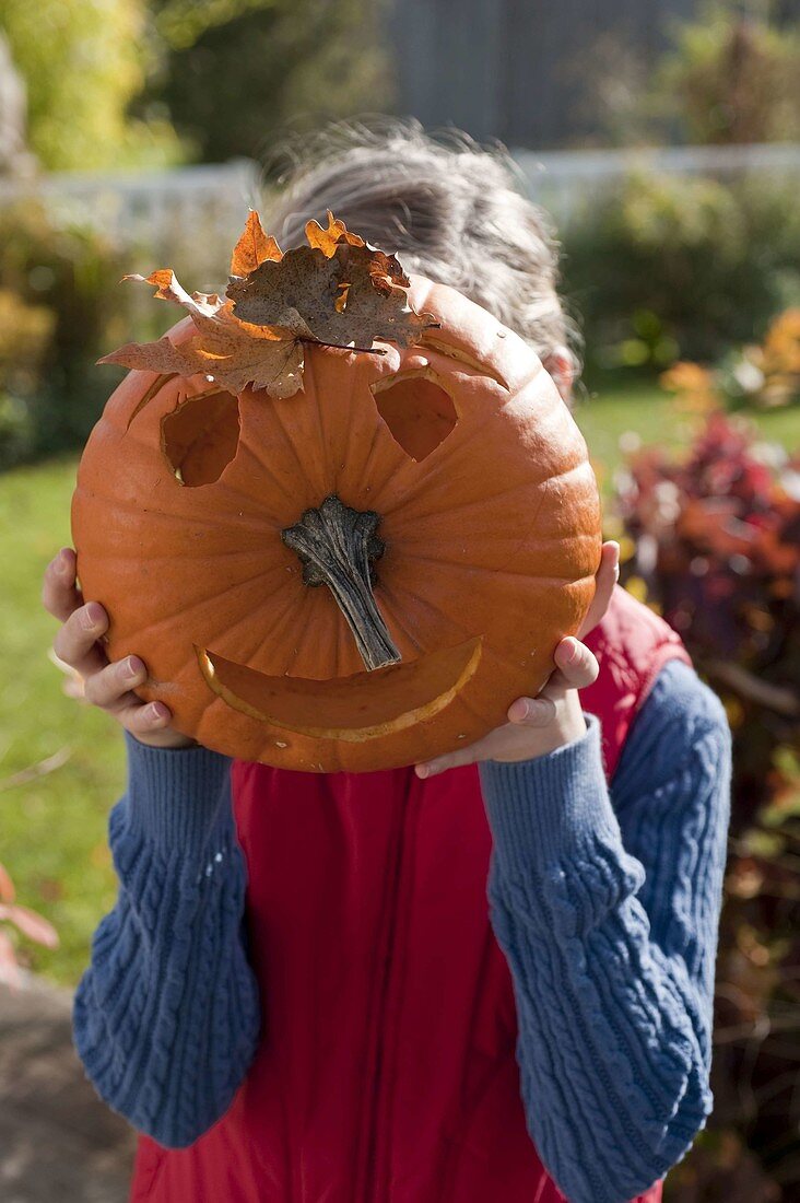 Halloween pumpkins with children