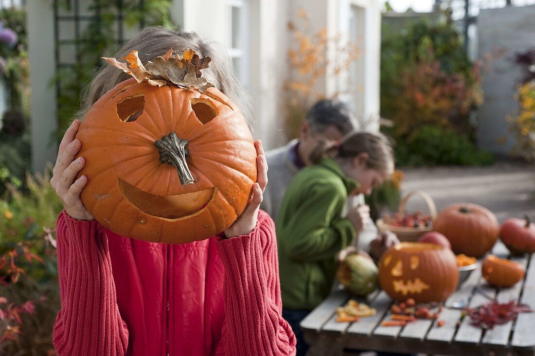 Halloween pumpkins with children