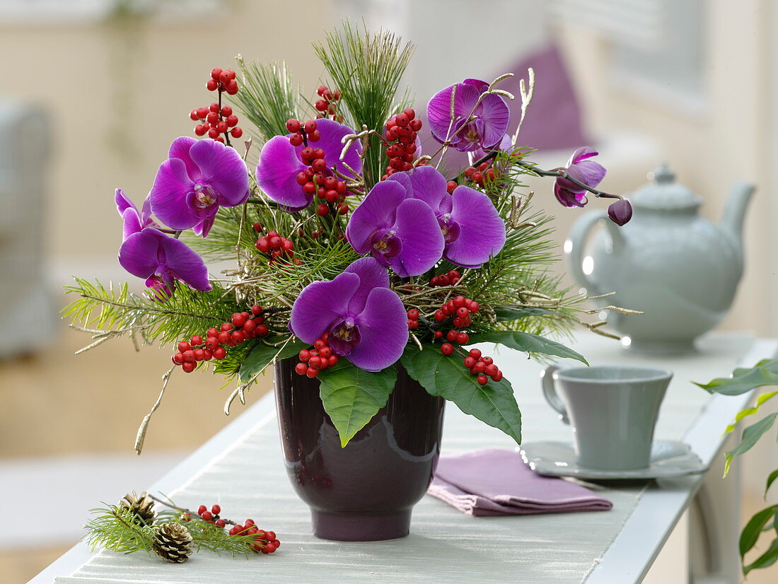 Winter bouquet with phalaenopsis, Ilex