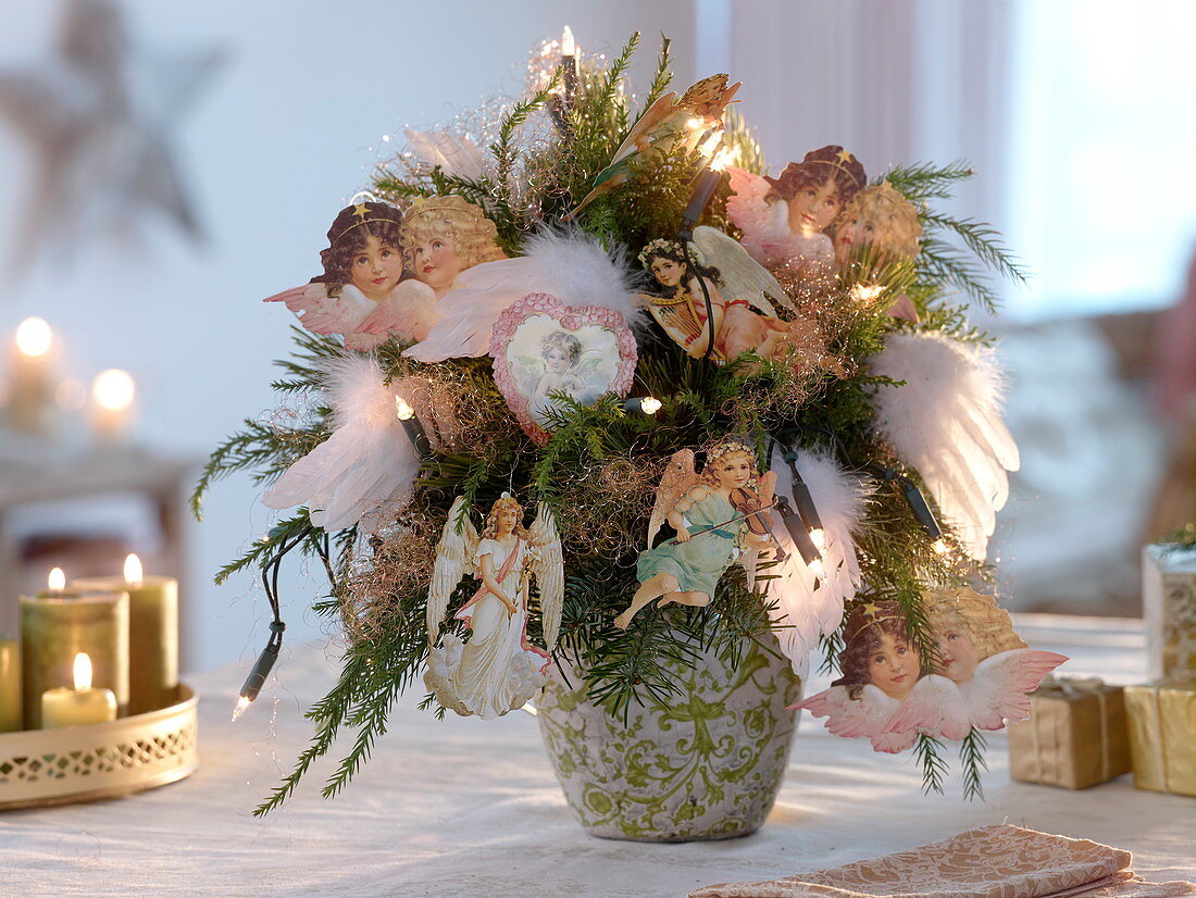 Christmas bouquet with angel wafers, wings of white feathers