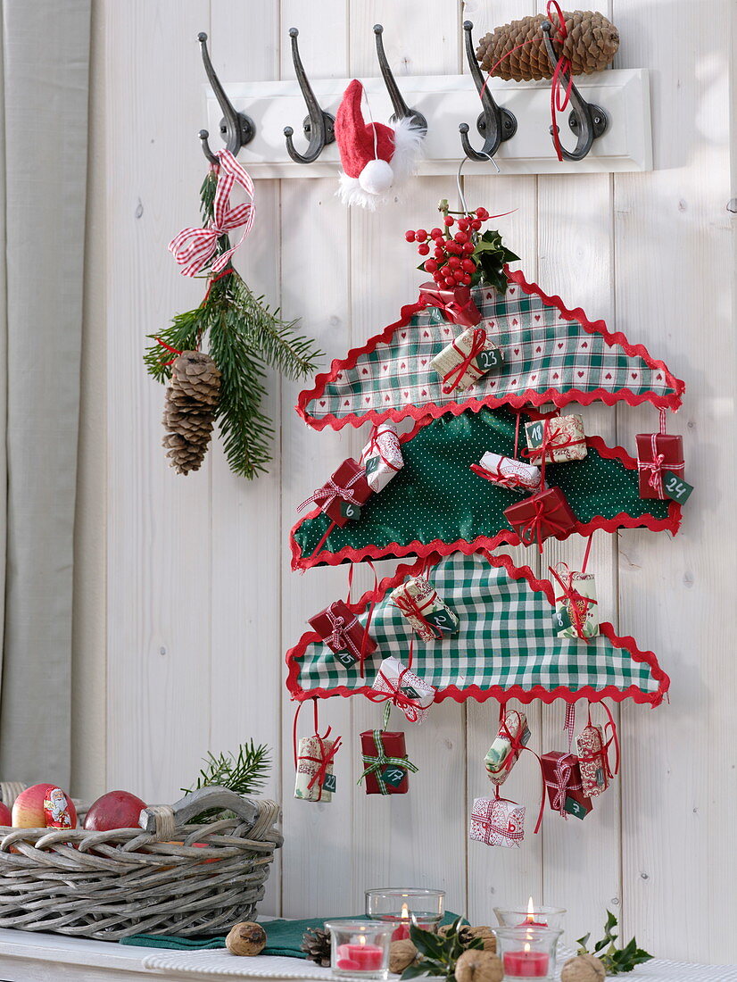 Self made advent calendar of fabric-covered wire hangers