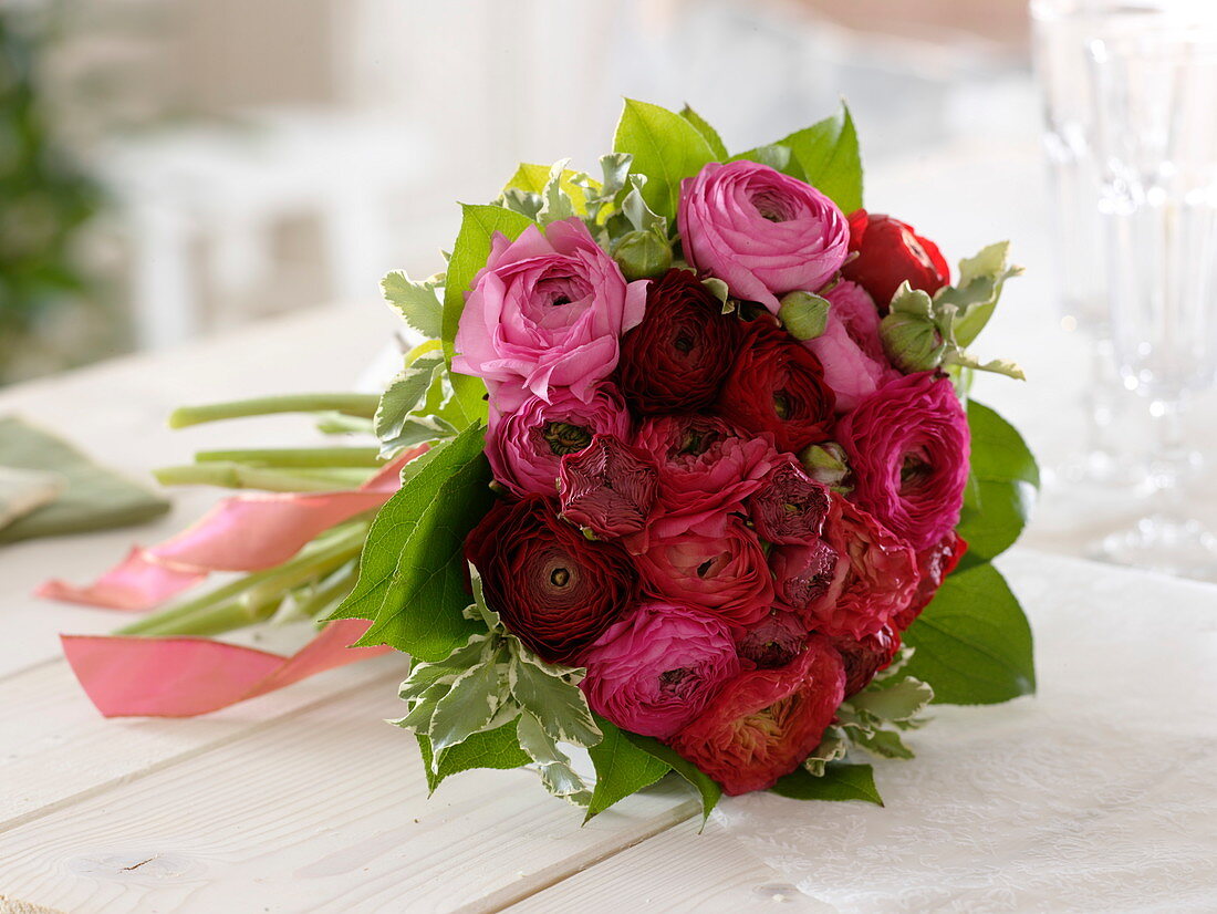 Small bouquet of Ranunculus (ranunculus), Pittosporum (pittosporum)