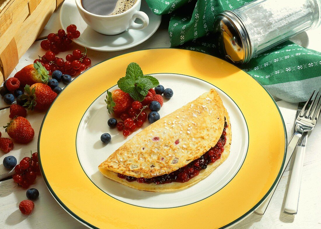 A crepe with mixed fresh berries