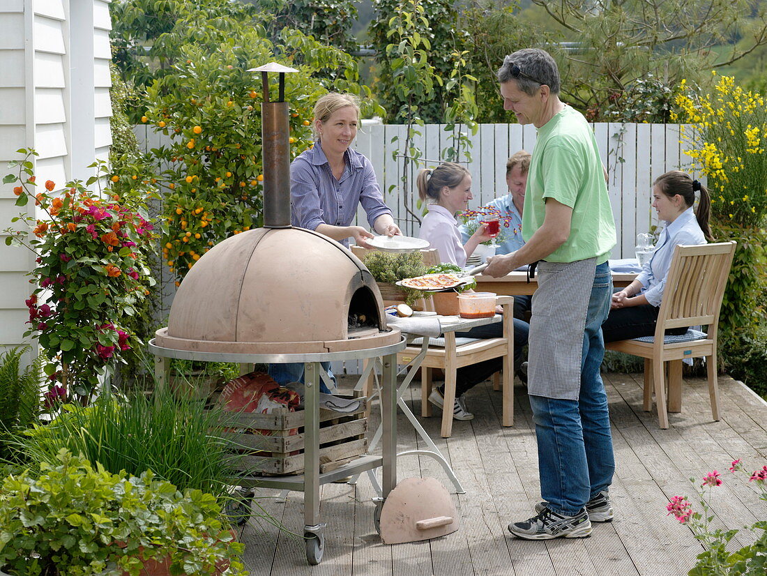 Pizza party on wooden terrace