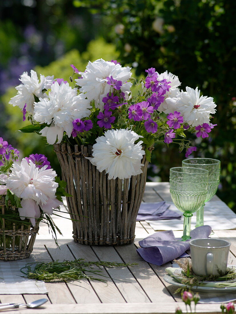 Early summer bouquet with Paeonia (peonies) and geranium