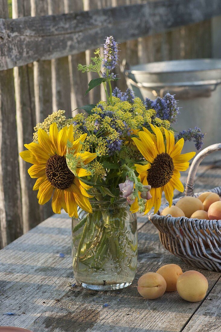 Bouquet of helianthus (sunflower), dill (anethum), agastache