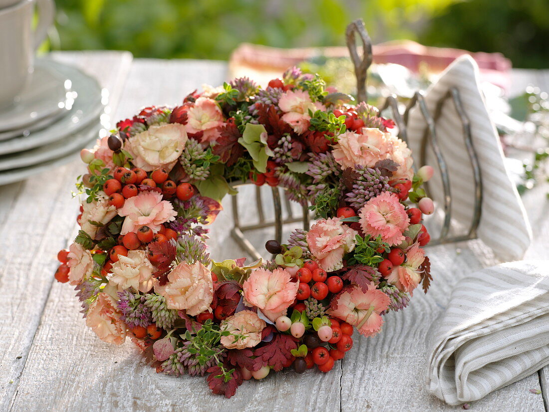 Wreath of Dianthus caryophyllus (carnations), Sorbus (rowan berries), Sedum