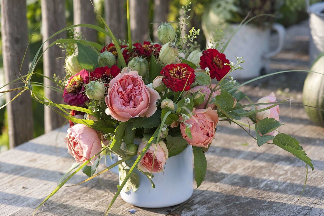 Small bouquet of pink (roses), zinnia (zinnias), nigella