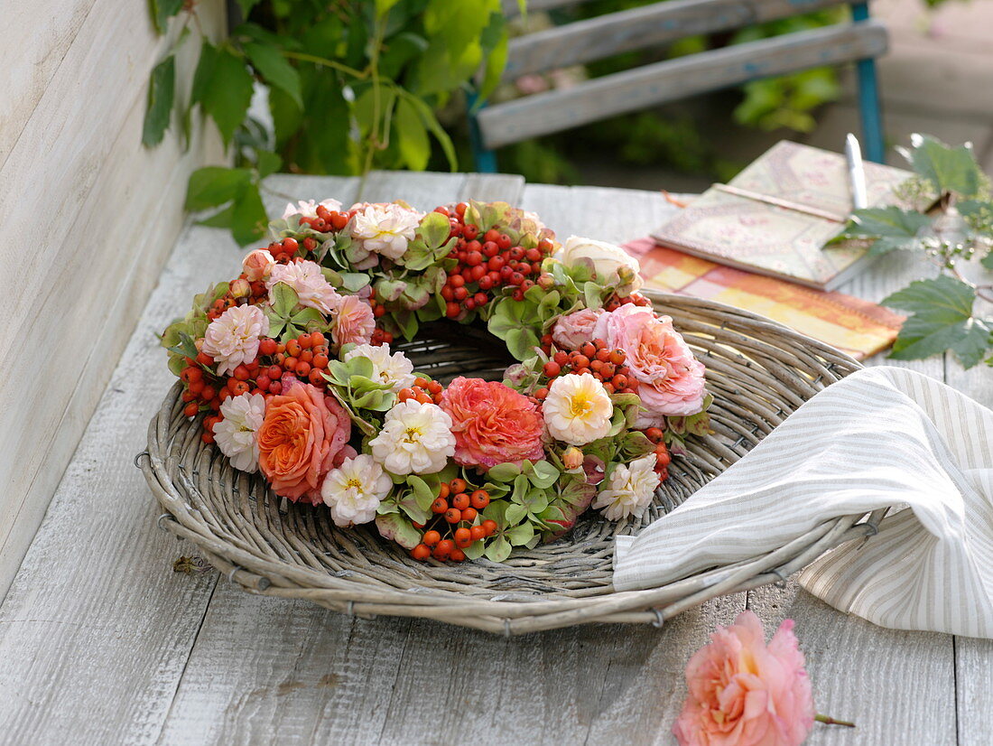 Late summer wreath of Rosa (roses), Sorbus (rowan berries) (2/2)