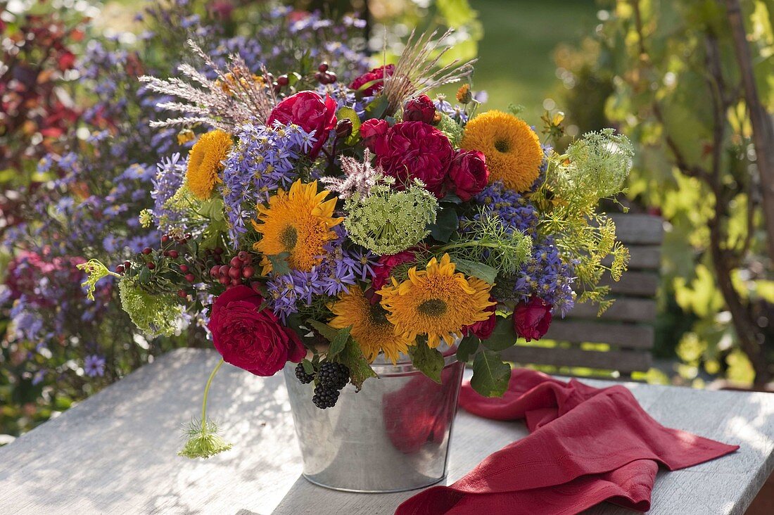 Bouquet of Helianthus (sunflower), Rosa 'Red Leonardo da Vinci' (roses)