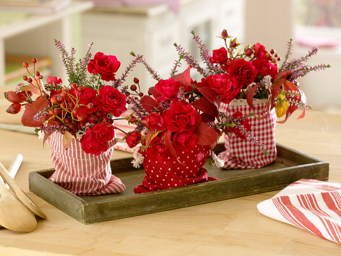 Autumnal bouquets placed in fabric bags