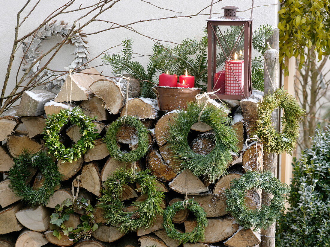 Rustic Christmas terrace with firewood pile