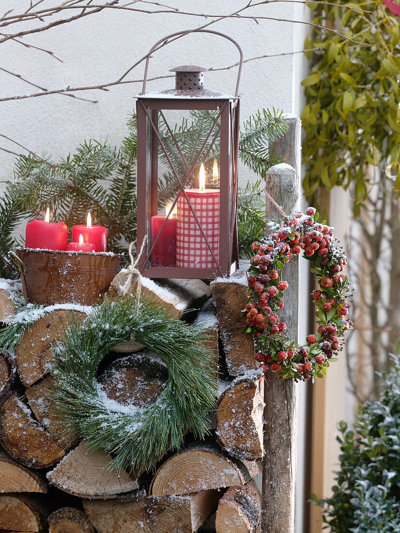 Rustic Christmas terrace with firewood pile