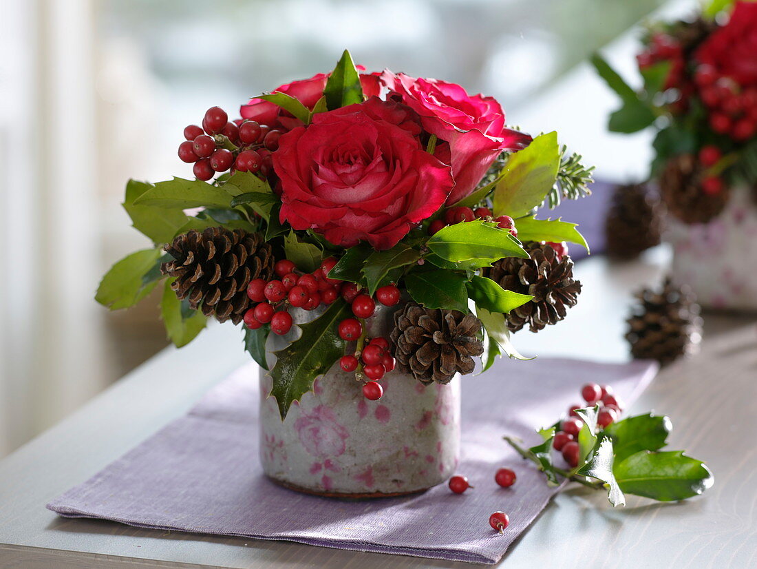 Small winter bouquet, Ilex, Rosa, cones of Pinus