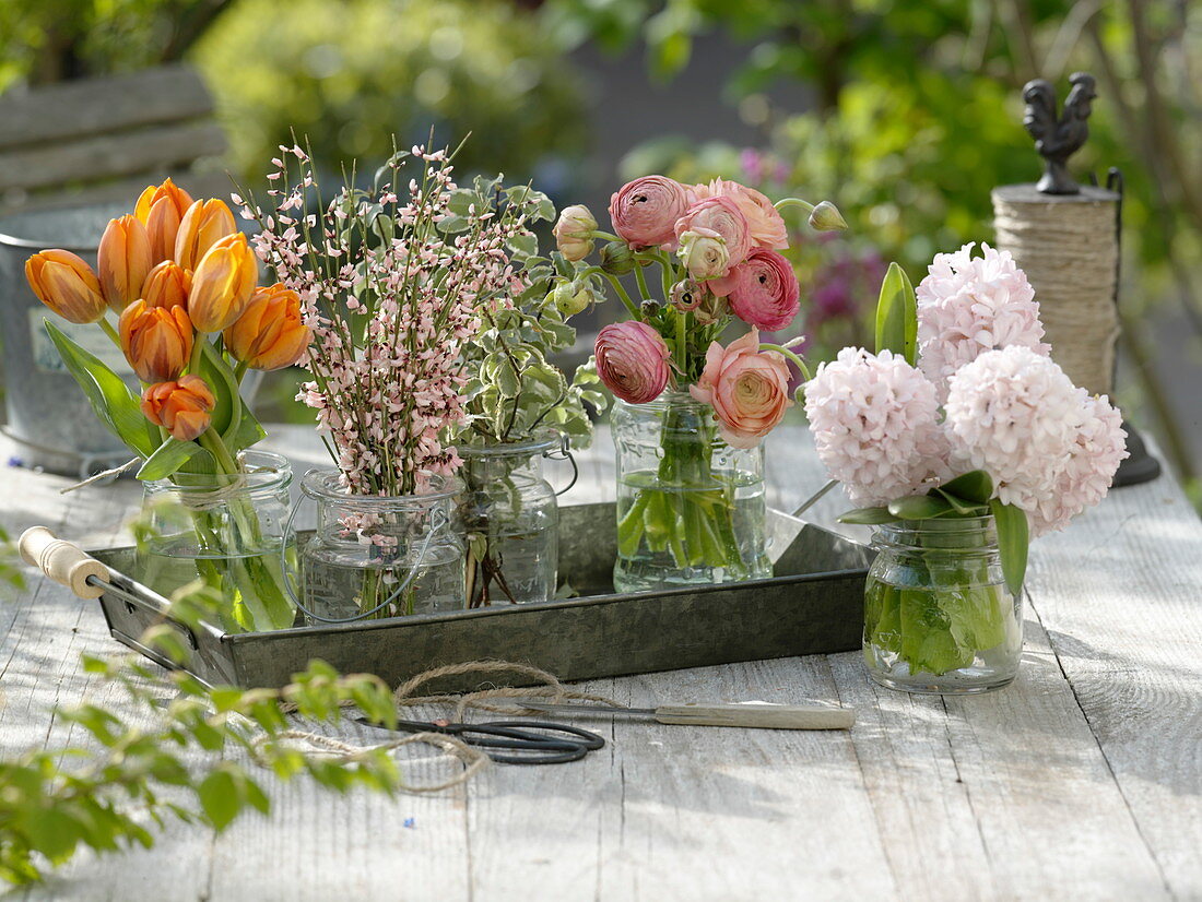 Ingredients for spring bouquets in tin buckets