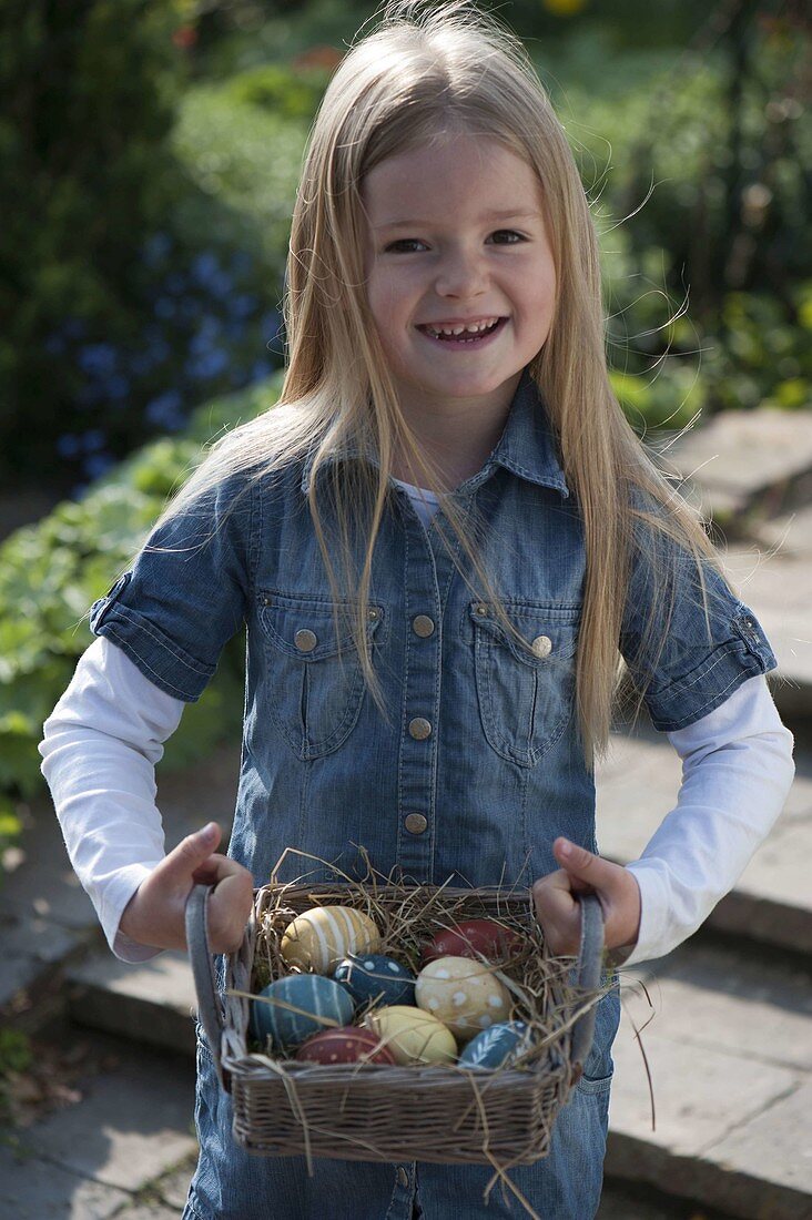 Girl with Easter nest