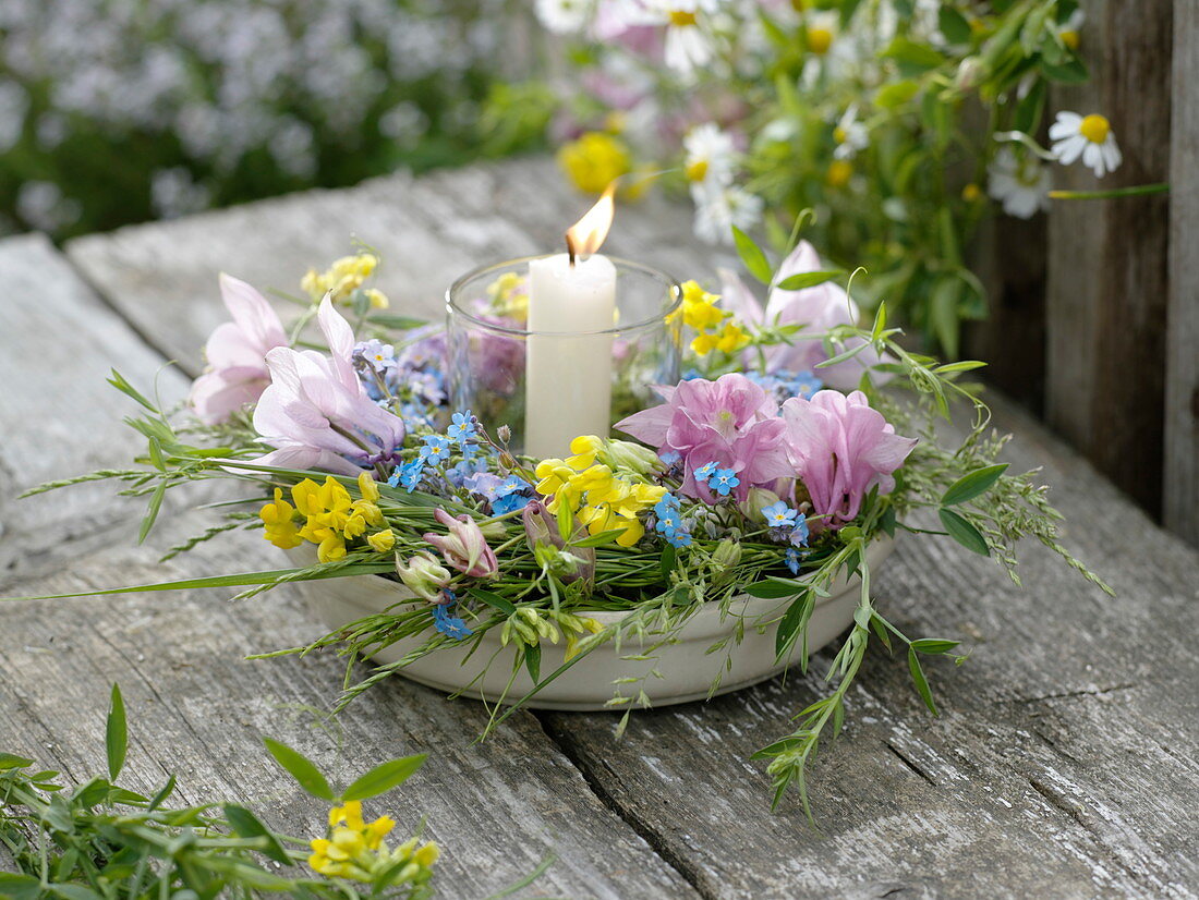 Spring wreath from Aquilegia, Myosotis, Lotus