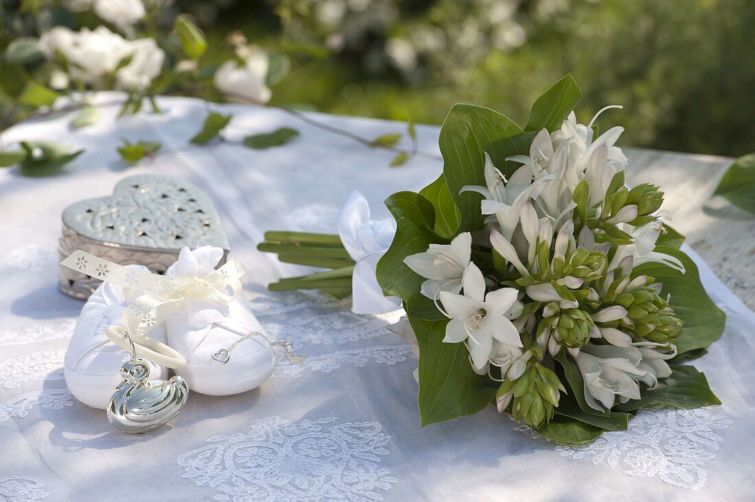 White christening bouquet with fragrant flowers of Hosta (Funkie)