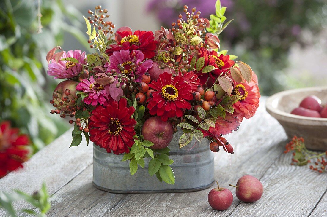 Red late summer bouquet in metal jardiniere